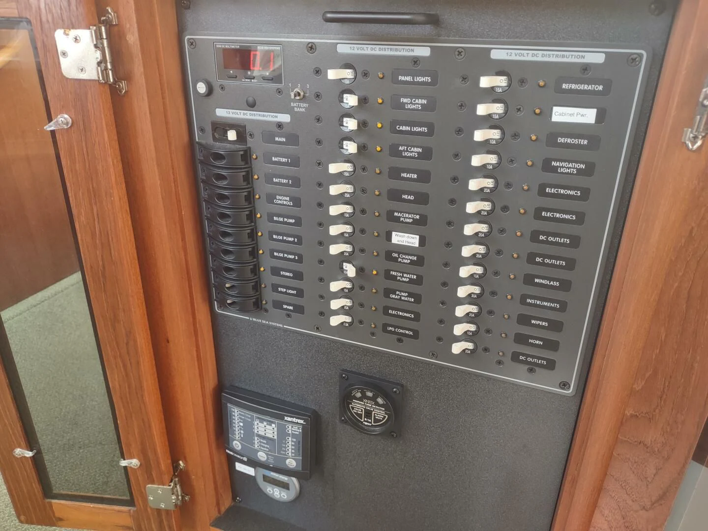 a black rectangular device aboard UNWINED Yacht for Charter