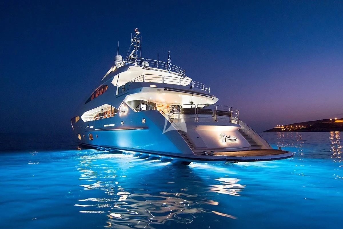 a large boat in the water aboard PATHOS Yacht for Sale