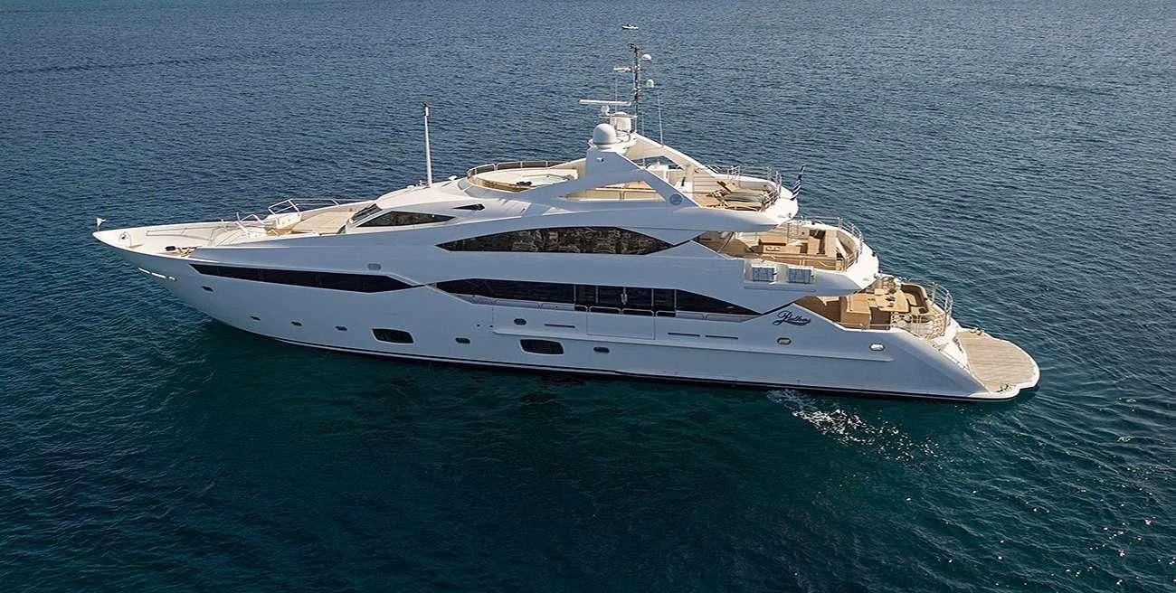 a white yacht in the ocean aboard PATHOS Yacht for Sale