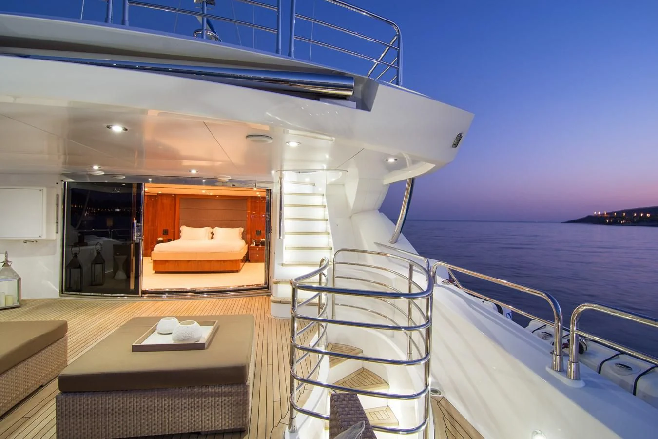 a boat with a table and chairs aboard PATHOS Yacht for Sale