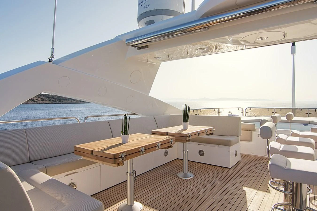 a room with a bed and a table aboard PATHOS Yacht for Sale