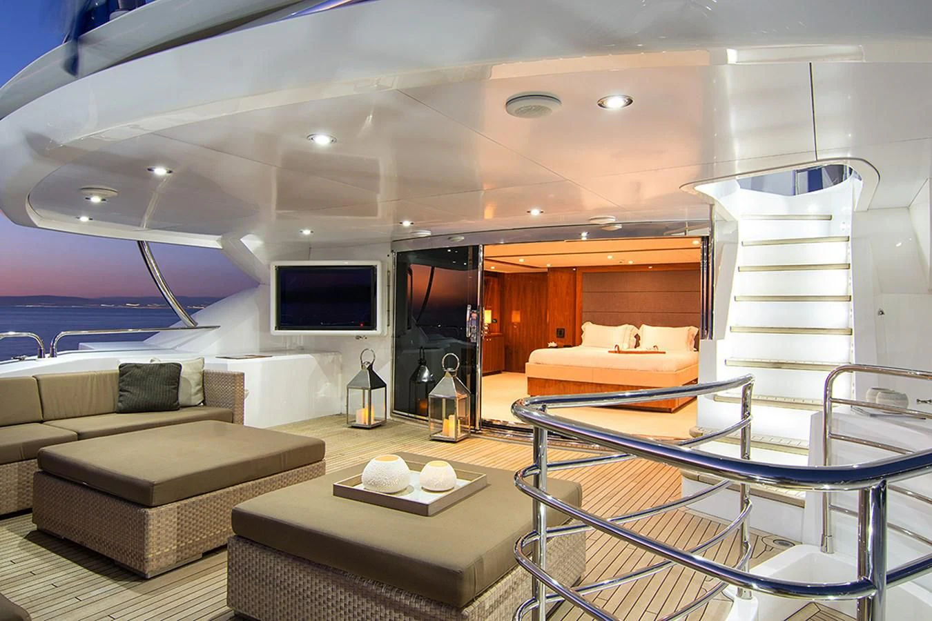 a living room with a large bed aboard PATHOS Yacht for Sale