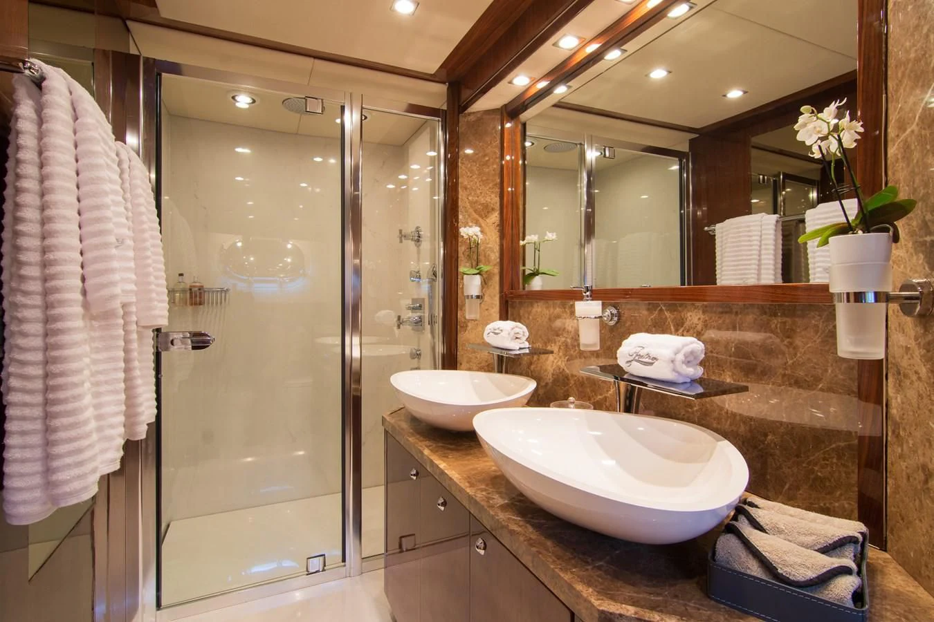 a bathroom with a sink and a shower aboard PATHOS Yacht for Sale