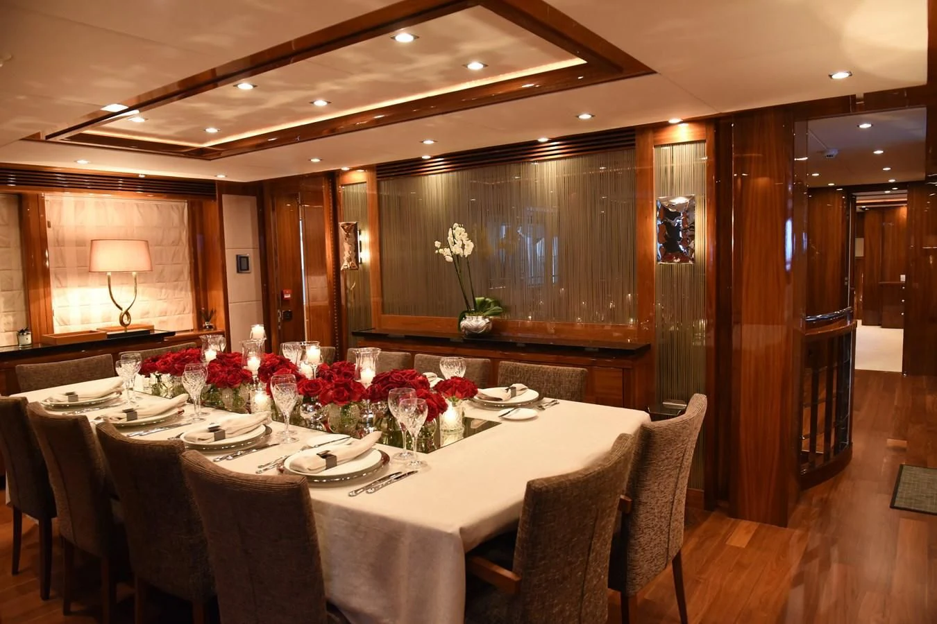 a large dining room table aboard PATHOS Yacht for Sale