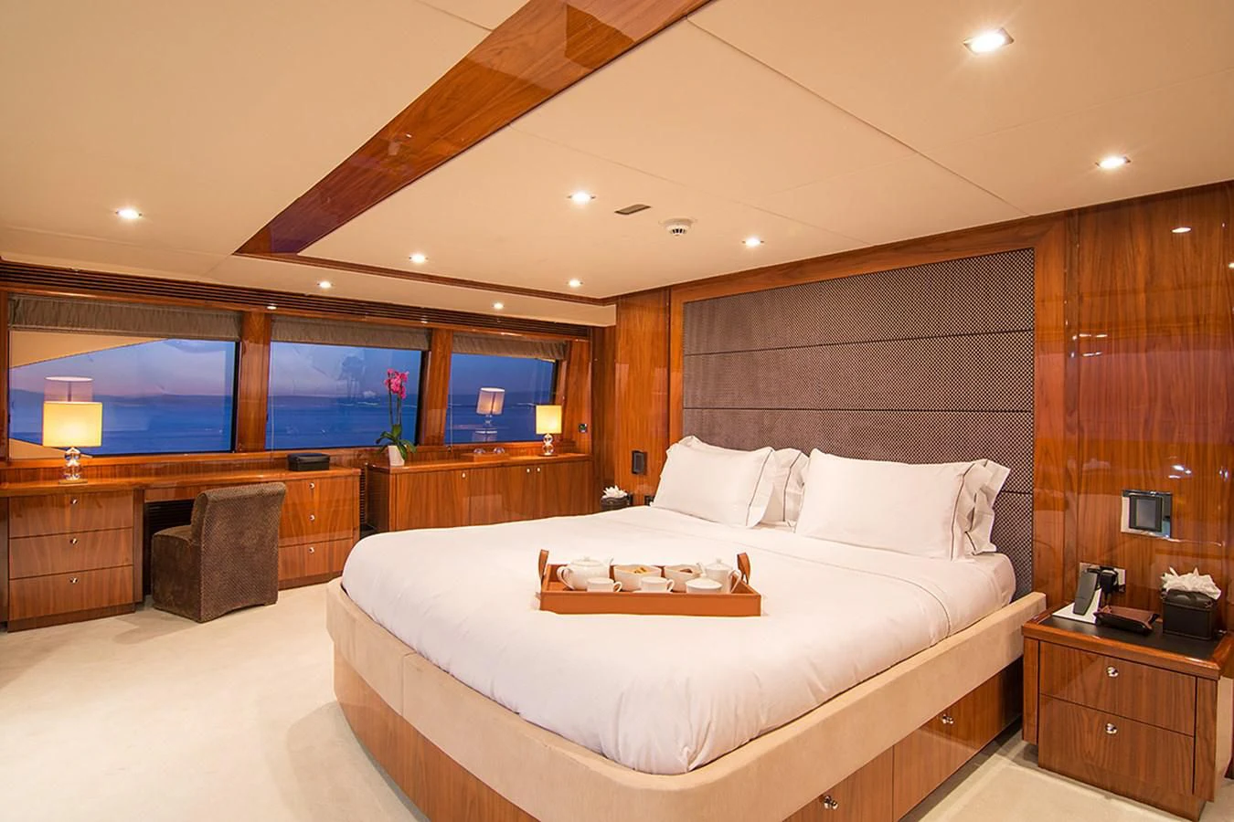a large bed in a room aboard PATHOS Yacht for Sale