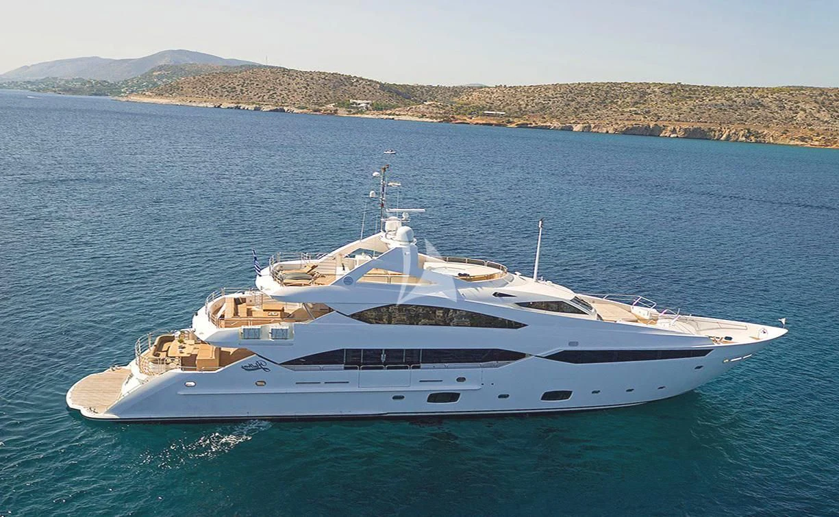 a white yacht in the water aboard PATHOS Yacht for Sale