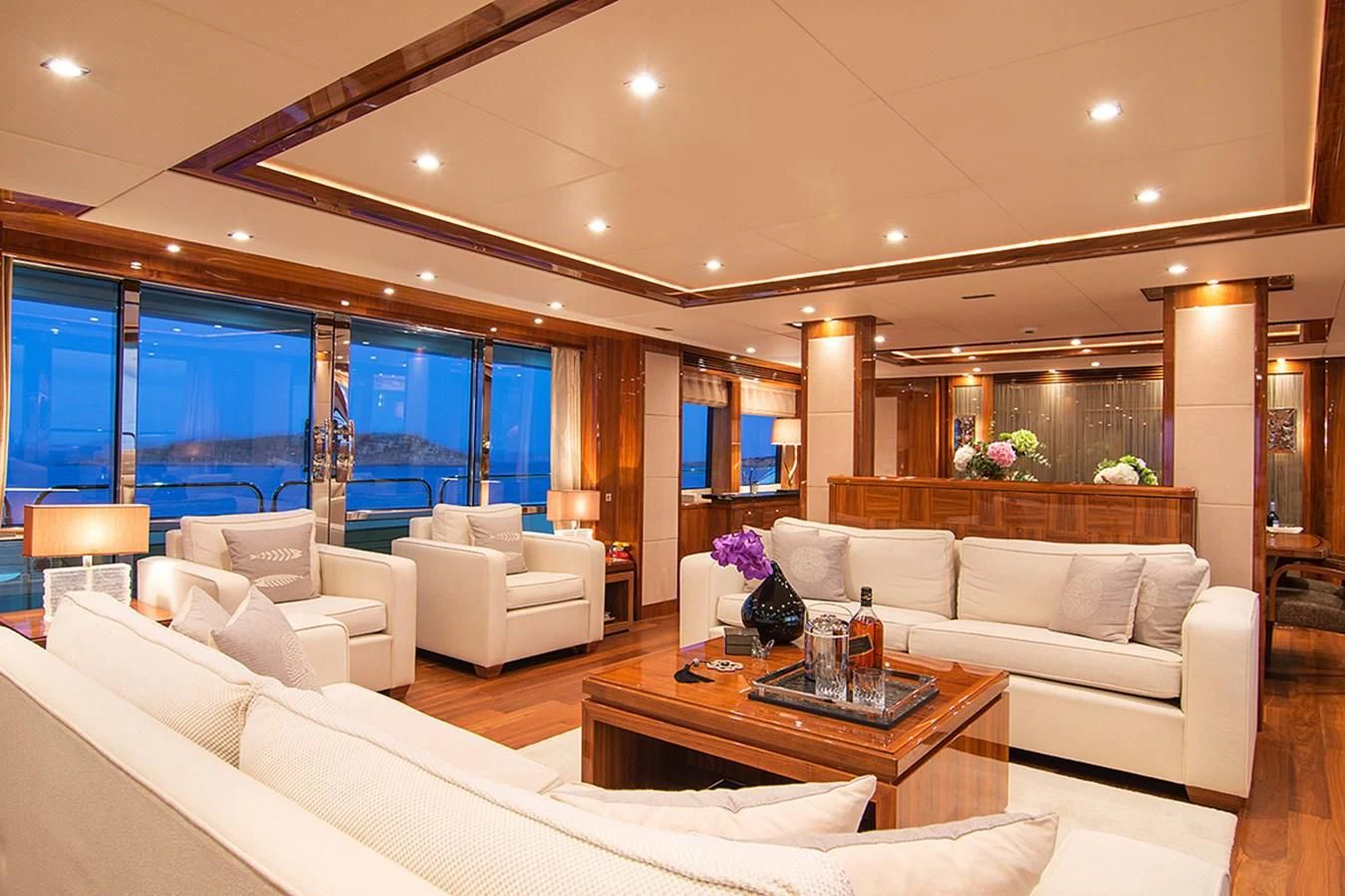a living room with a large window aboard PATHOS Yacht for Sale