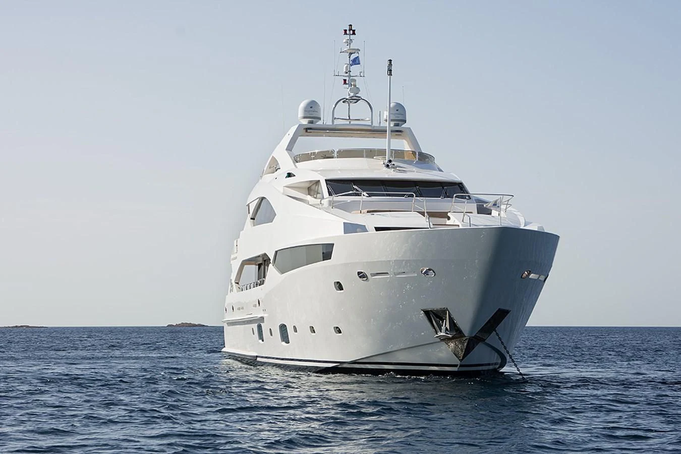 a white yacht in the water aboard PATHOS Yacht for Sale