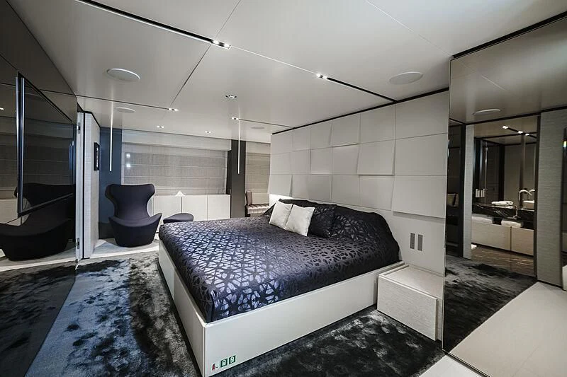 a large bedroom with a bed aboard NEWAL Yacht for Sale