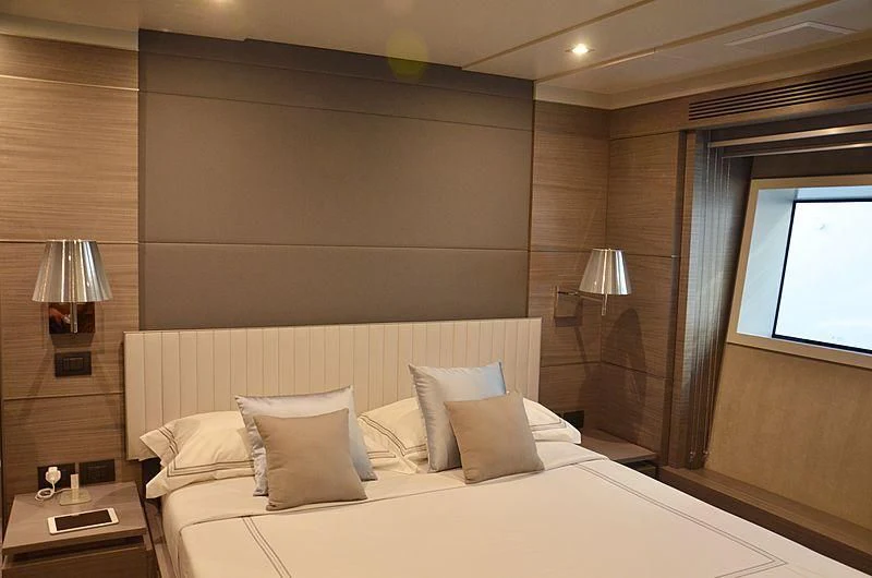 a bed with pillows aboard CHARISMA Yacht for Sale