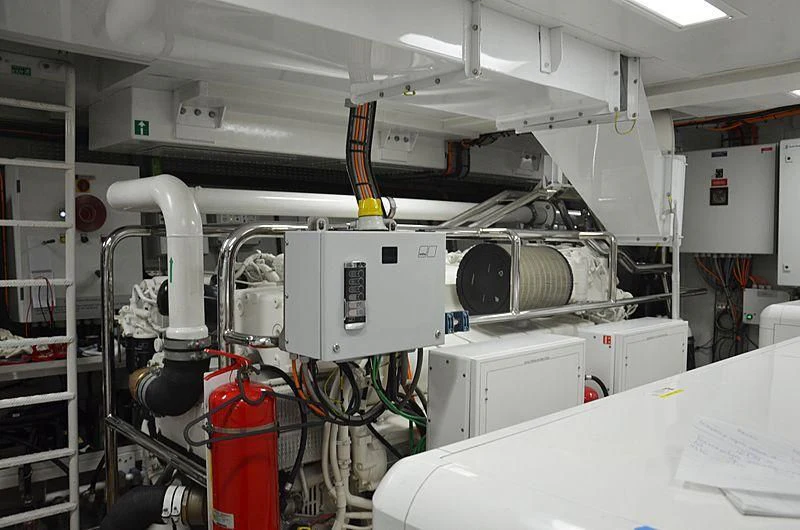 a room with machinery and pipes aboard CHARISMA Yacht for Sale