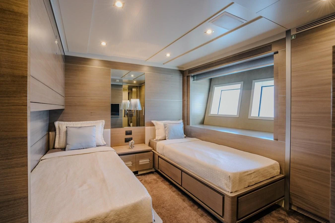a room with two beds aboard CHARISMA Yacht for Sale