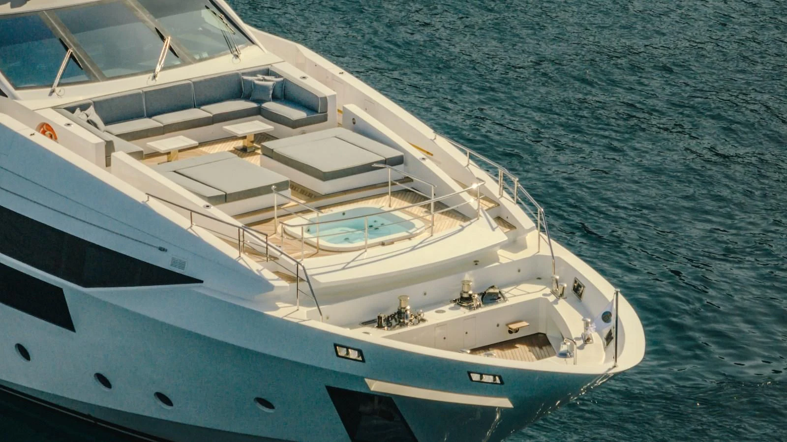a white yacht in the water aboard CHARISMA Yacht for Sale