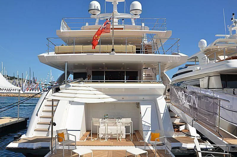 a boat docked at a pier aboard CHARISMA Yacht for Sale