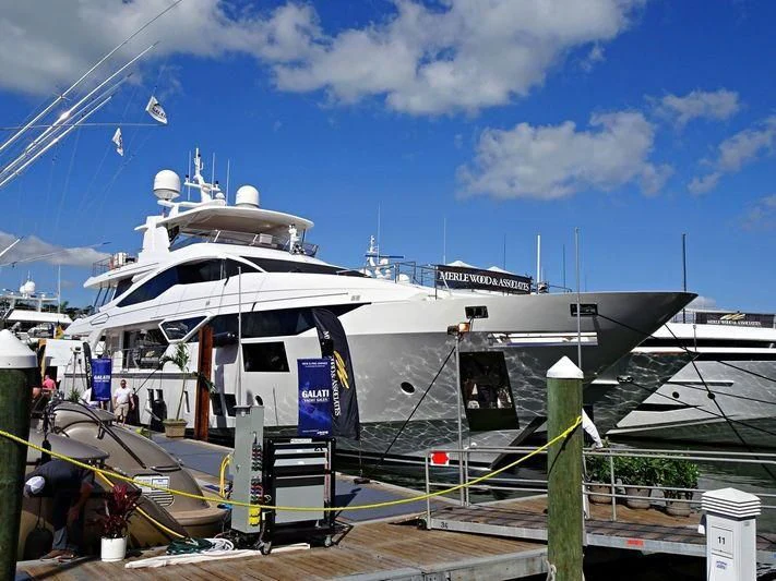 a large white ship docked aboard CHARISMA Yacht for Sale
