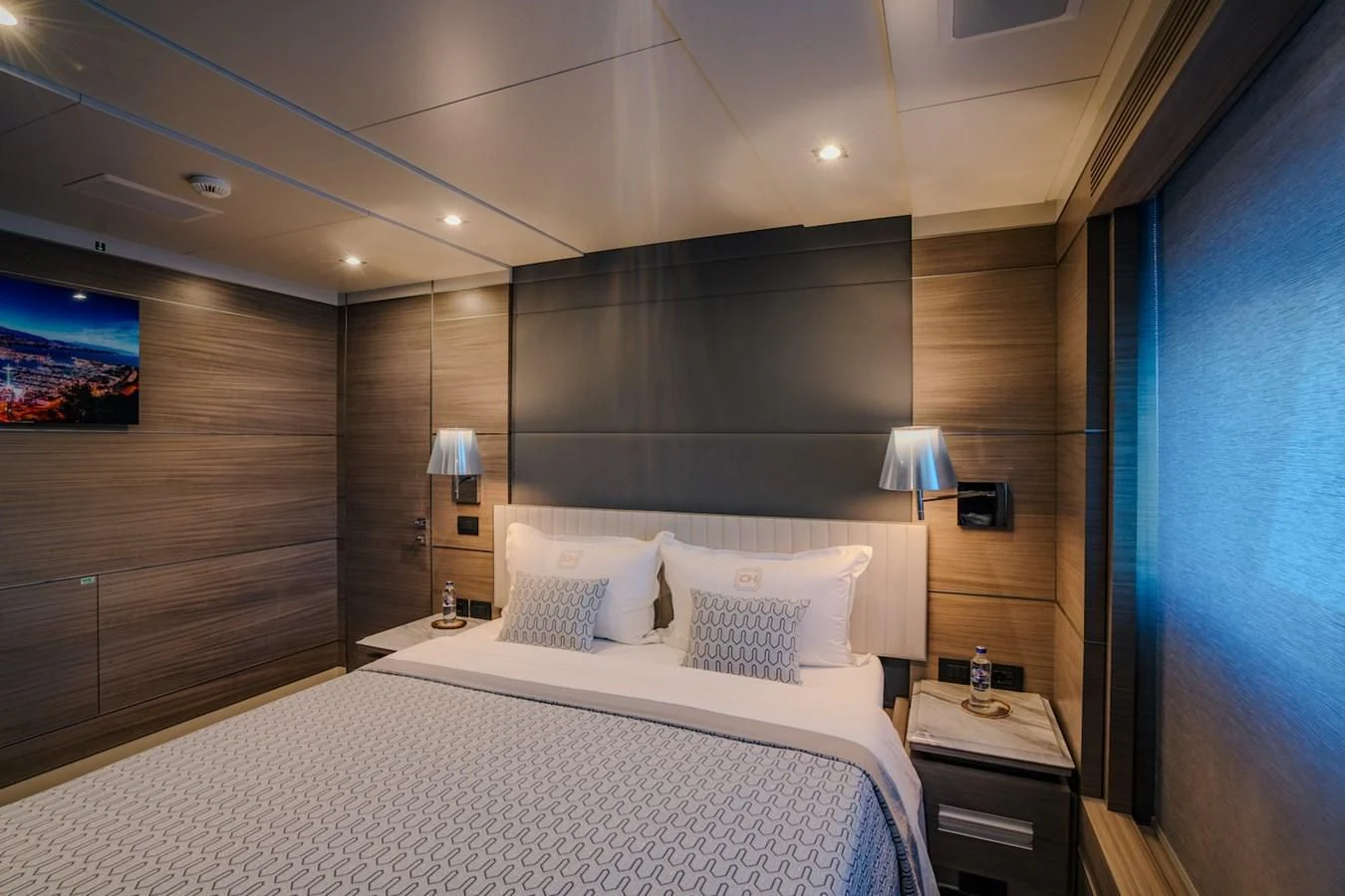 a bedroom with a large bed aboard CHARISMA Yacht for Sale