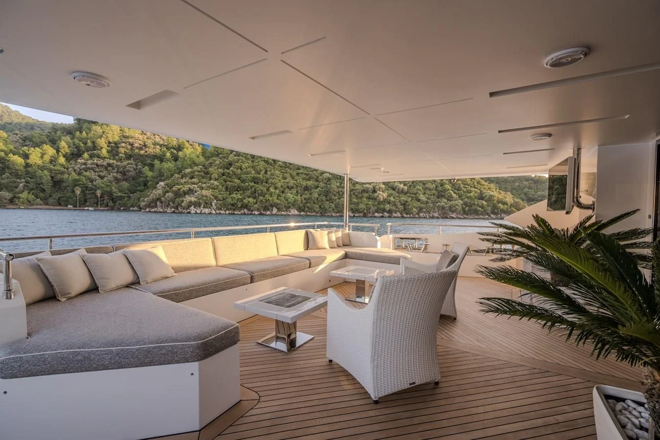 a living room with a large pool aboard CHARISMA Yacht for Sale