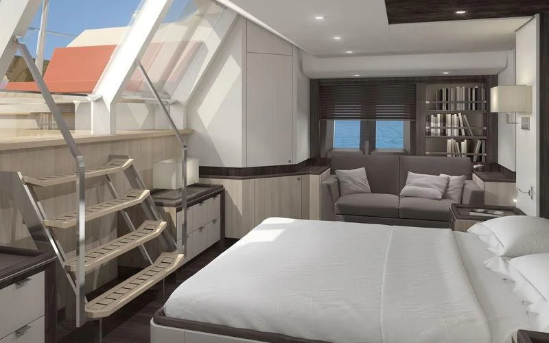 a bedroom with a bed and a couch aboard JONGERT 3200P Yacht for Sale