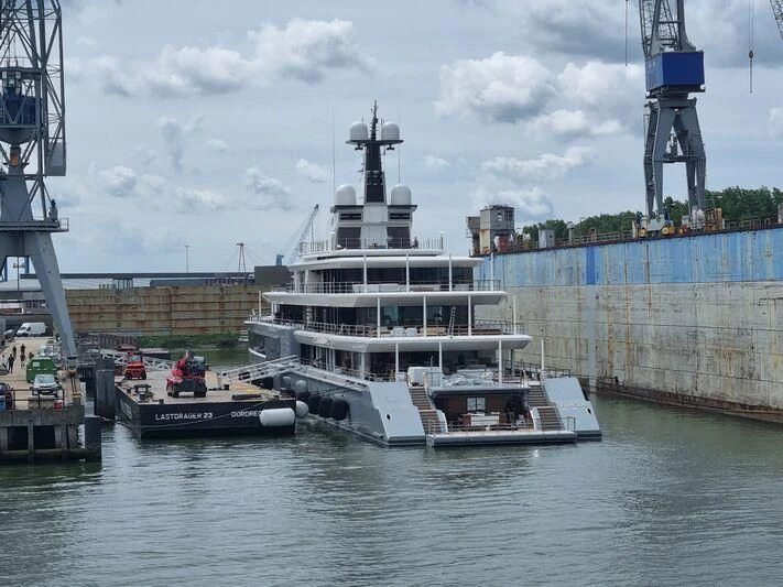 a large white boat sits in the water aboard SEVEN SEAS Yacht for Sale