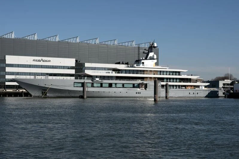 a large cruise ship docked aboard SEVEN SEAS Yacht for Sale