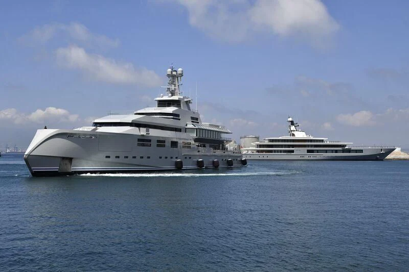 a large white ship in the water aboard SEVEN SEAS Yacht for Sale