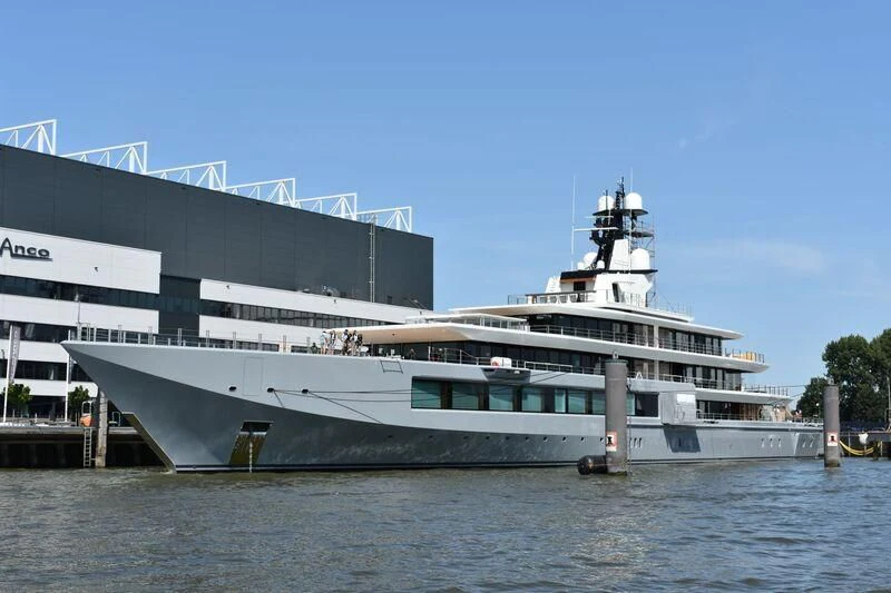 a large cruise ship docked aboard SEVEN SEAS Yacht for Sale