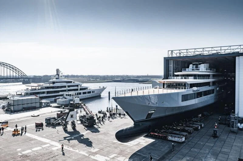 a large ship docked at a port aboard SEVEN SEAS Yacht for Sale