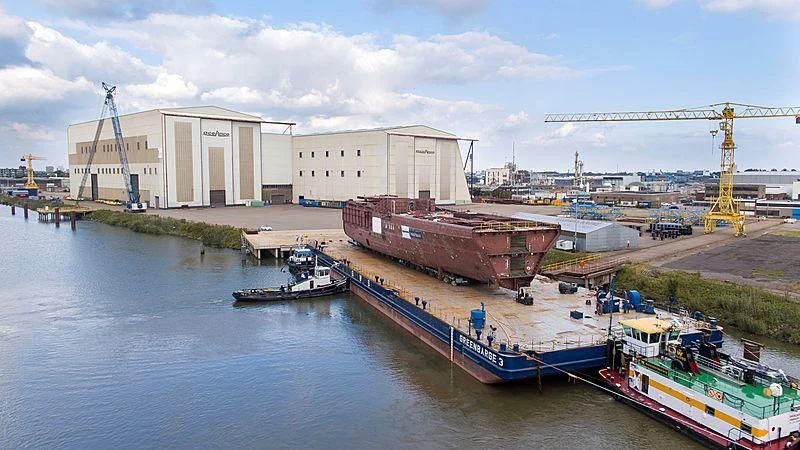 a large ship docked at a port aboard SEVEN SEAS Yacht for Sale