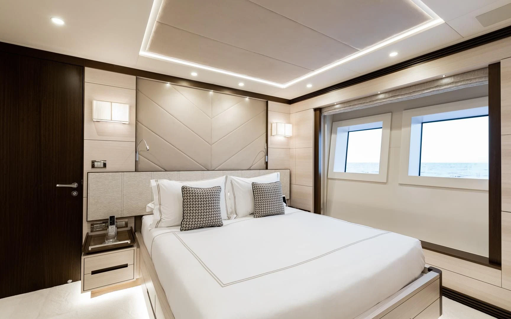 a bedroom with a bed aboard CALYPSO Yacht for Charter