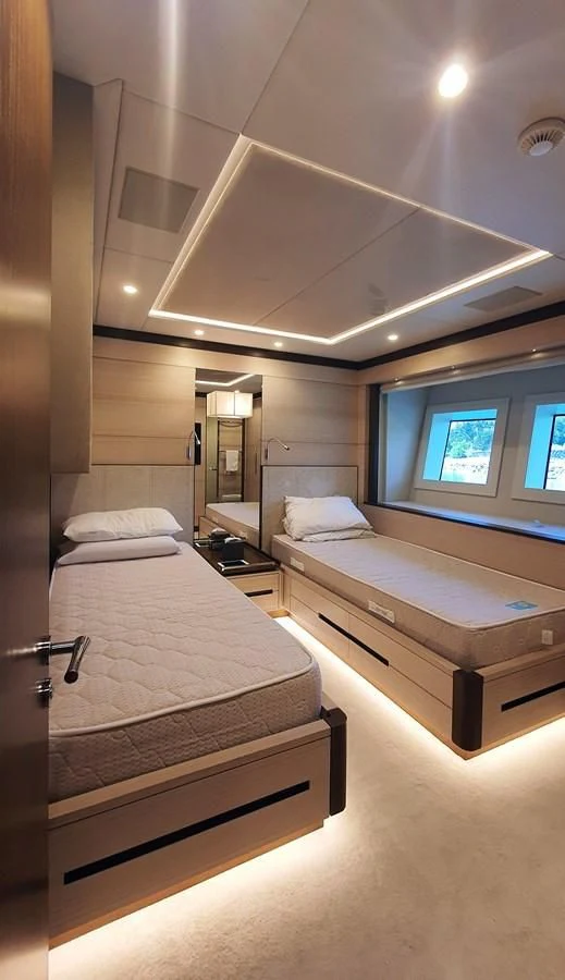 a room with two beds aboard CALYPSO Yacht for Charter