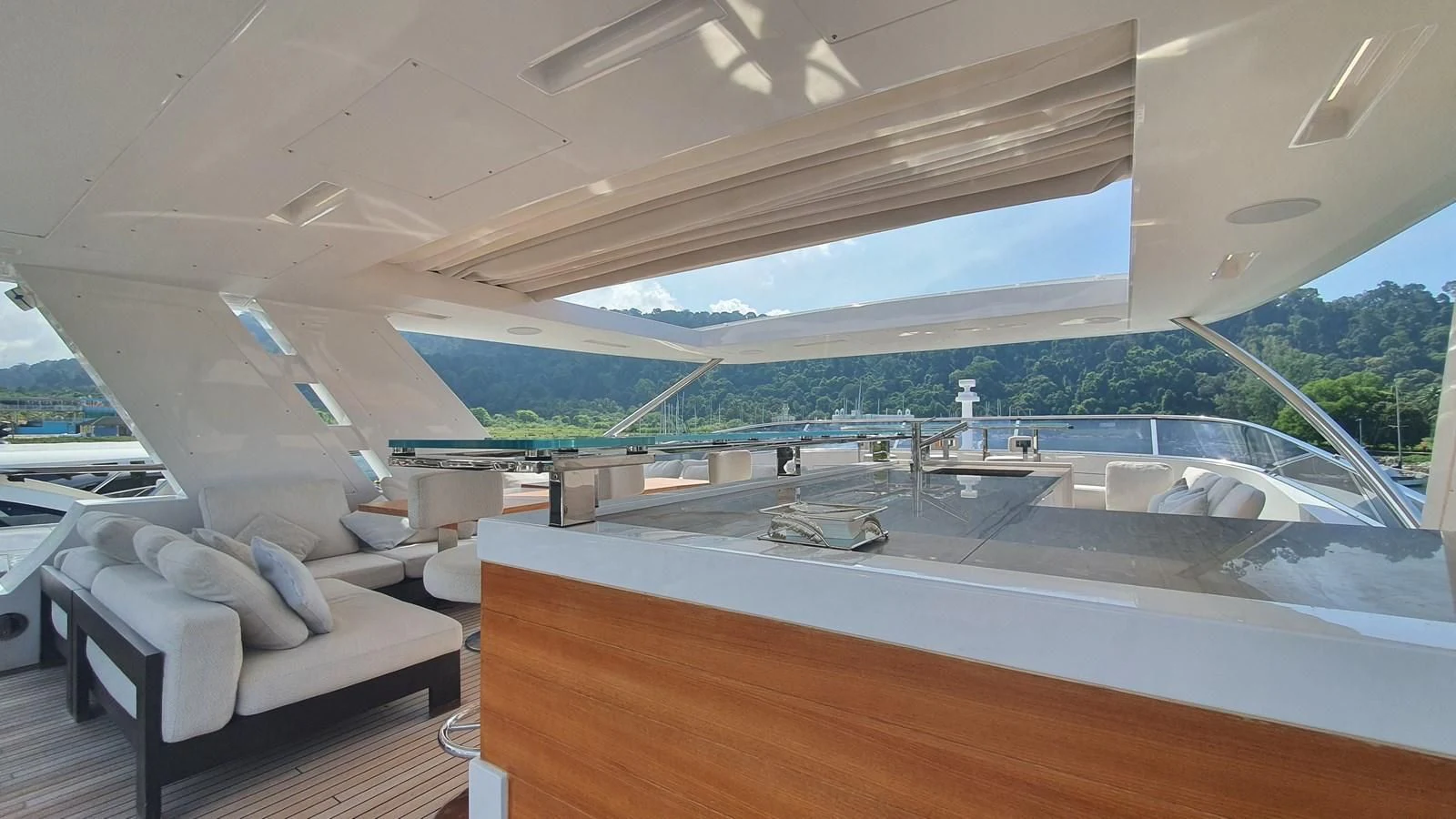 a room with a large tub and a bed aboard CALYPSO Yacht for Charter