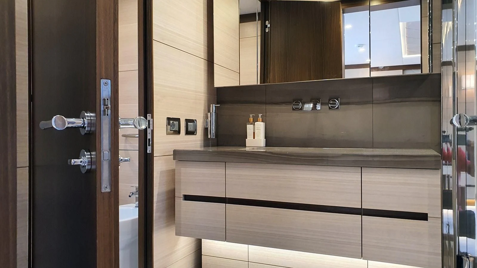 a bathroom with a glass shower aboard CALYPSO Yacht for Charter