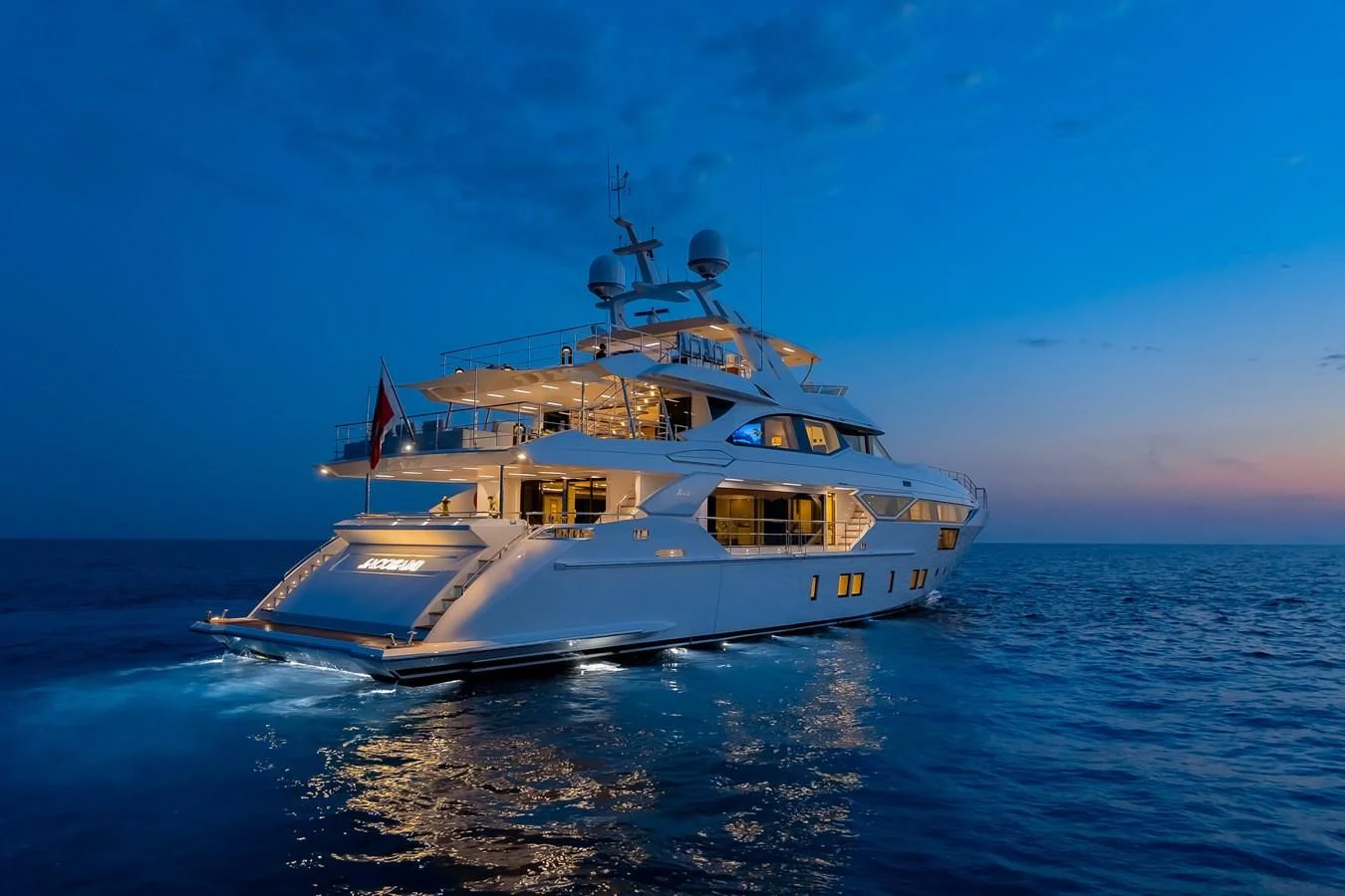a large white boat in the water aboard CALYPSO Yacht for Charter