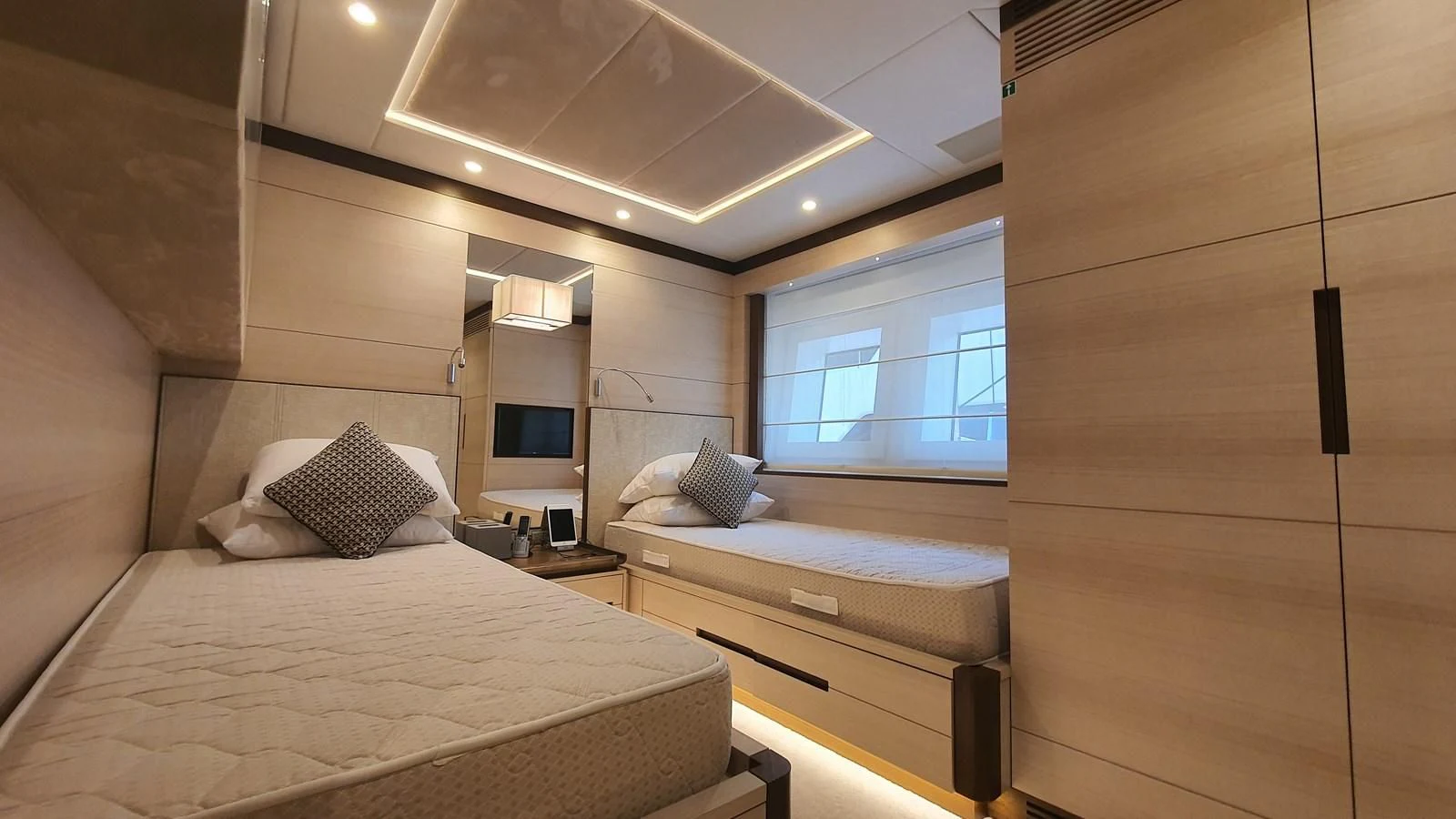a room with two beds aboard CALYPSO Yacht for Charter
