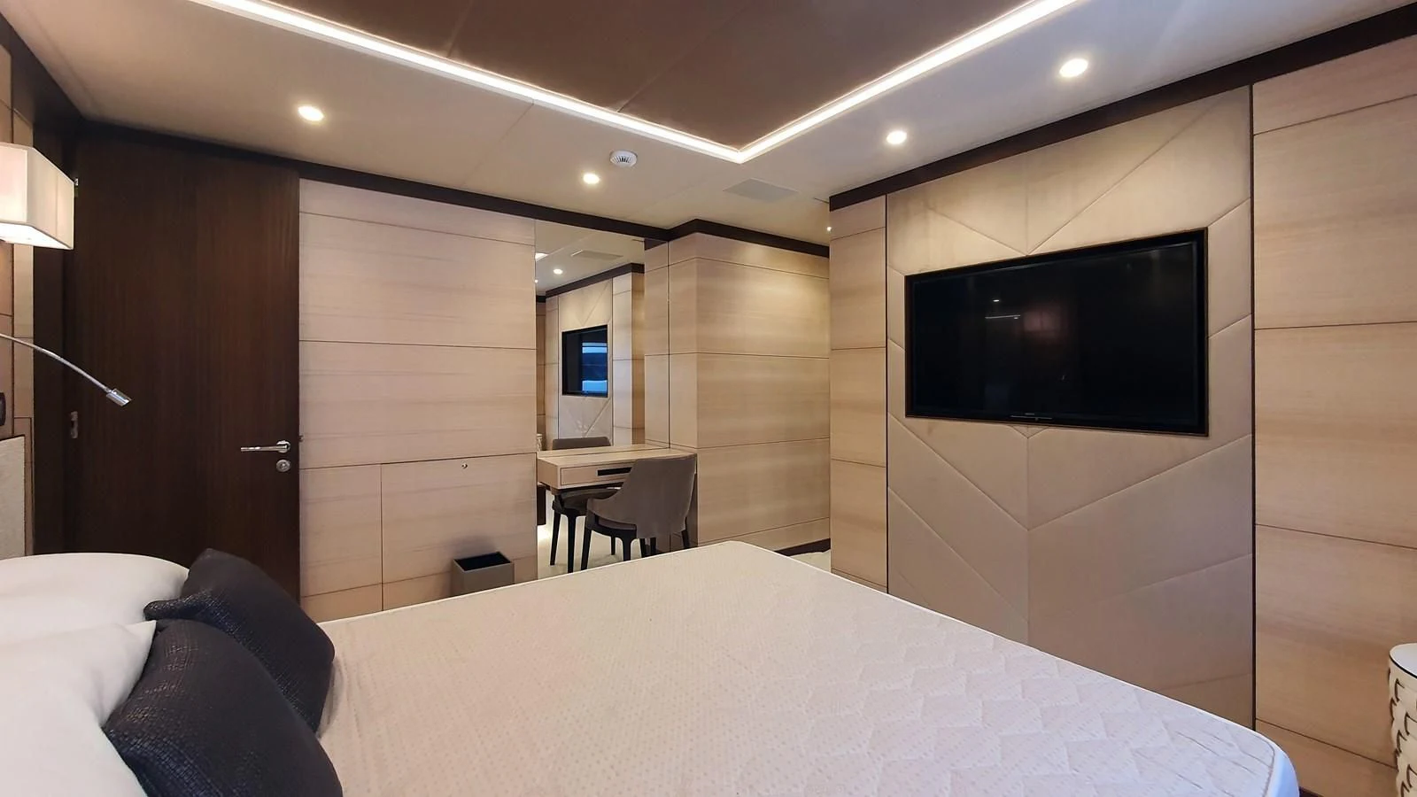 a bed in a room aboard CALYPSO Yacht for Charter