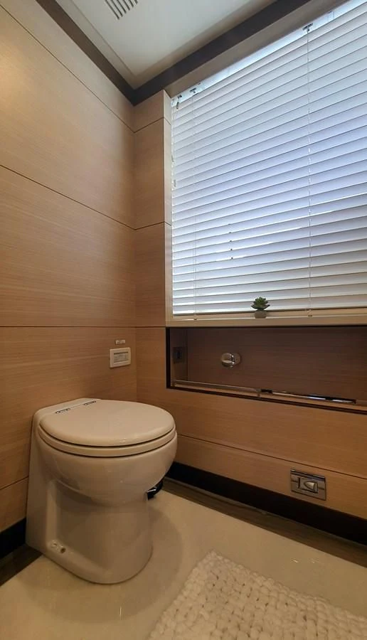 a toilet in a bathroom aboard CALYPSO Yacht for Charter