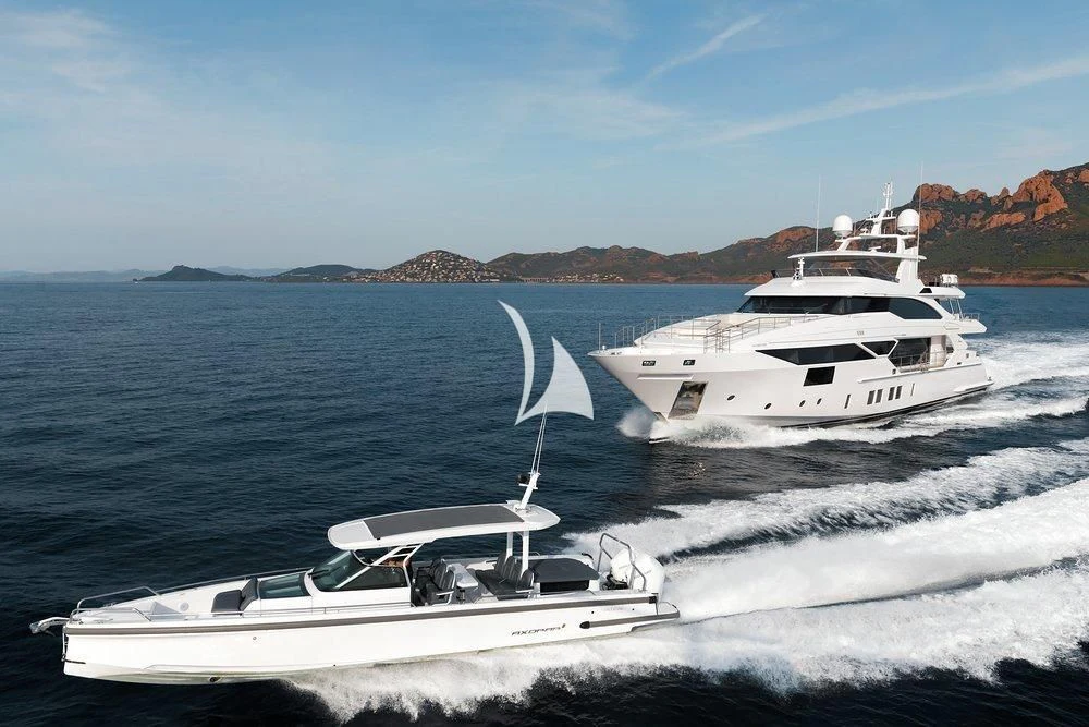 a couple of white boats on the water aboard CALYPSO Yacht for Charter