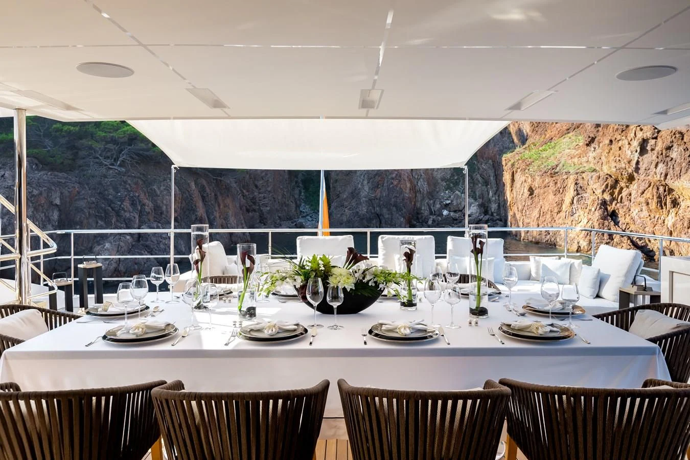 a table set for a dinner aboard CALYPSO Yacht for Charter