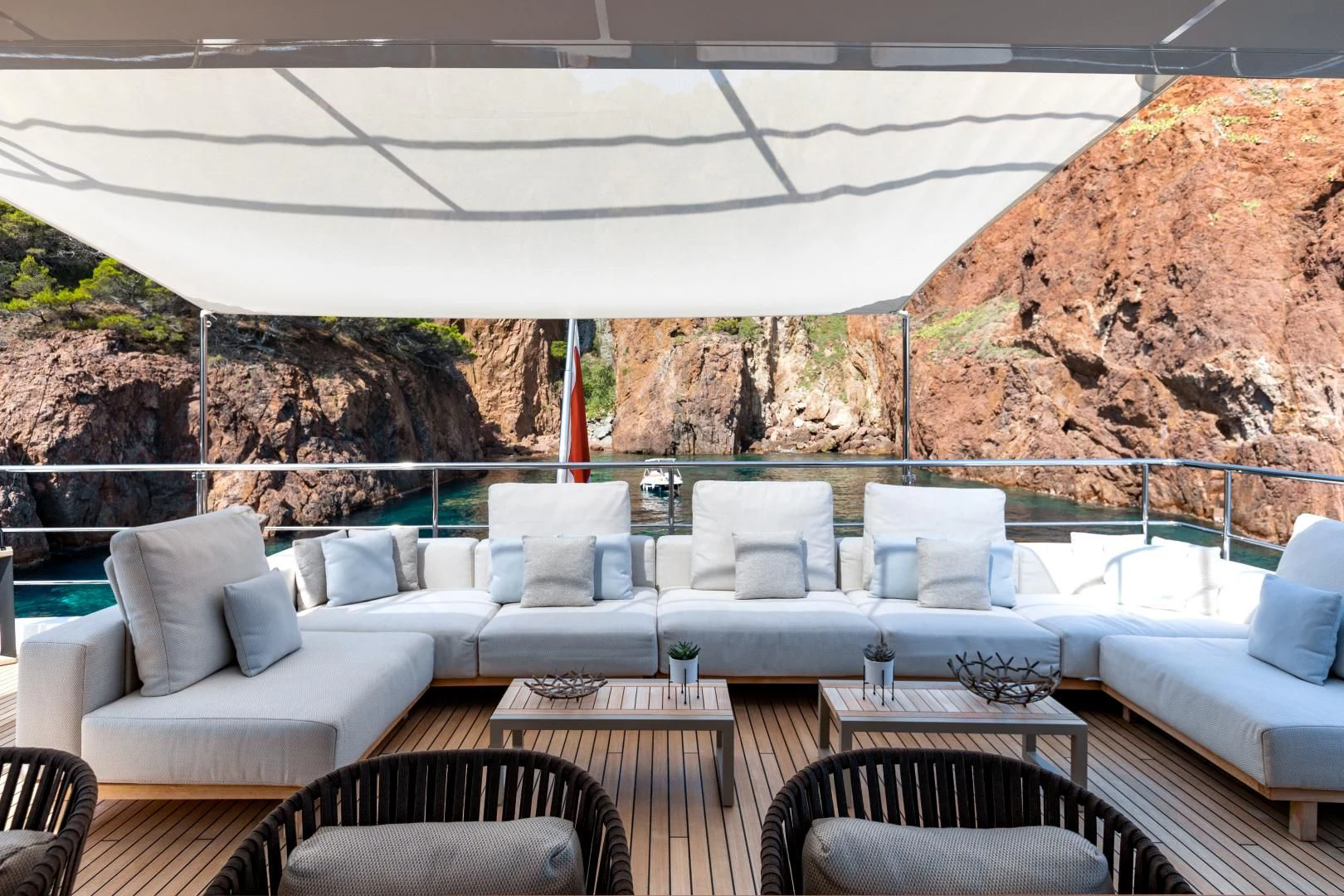 a patio with a table and chairs aboard CALYPSO Yacht for Charter