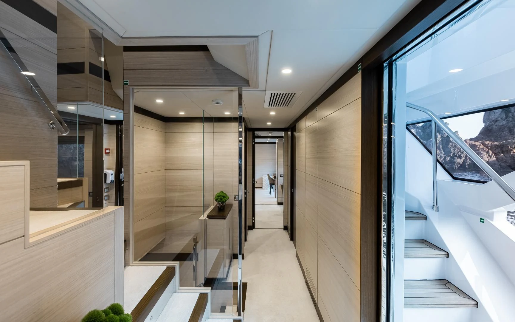 a hallway with glass doors aboard CALYPSO Yacht for Charter