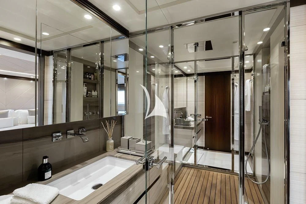 a bathroom with a large glass shower aboard CALYPSO Yacht for Charter