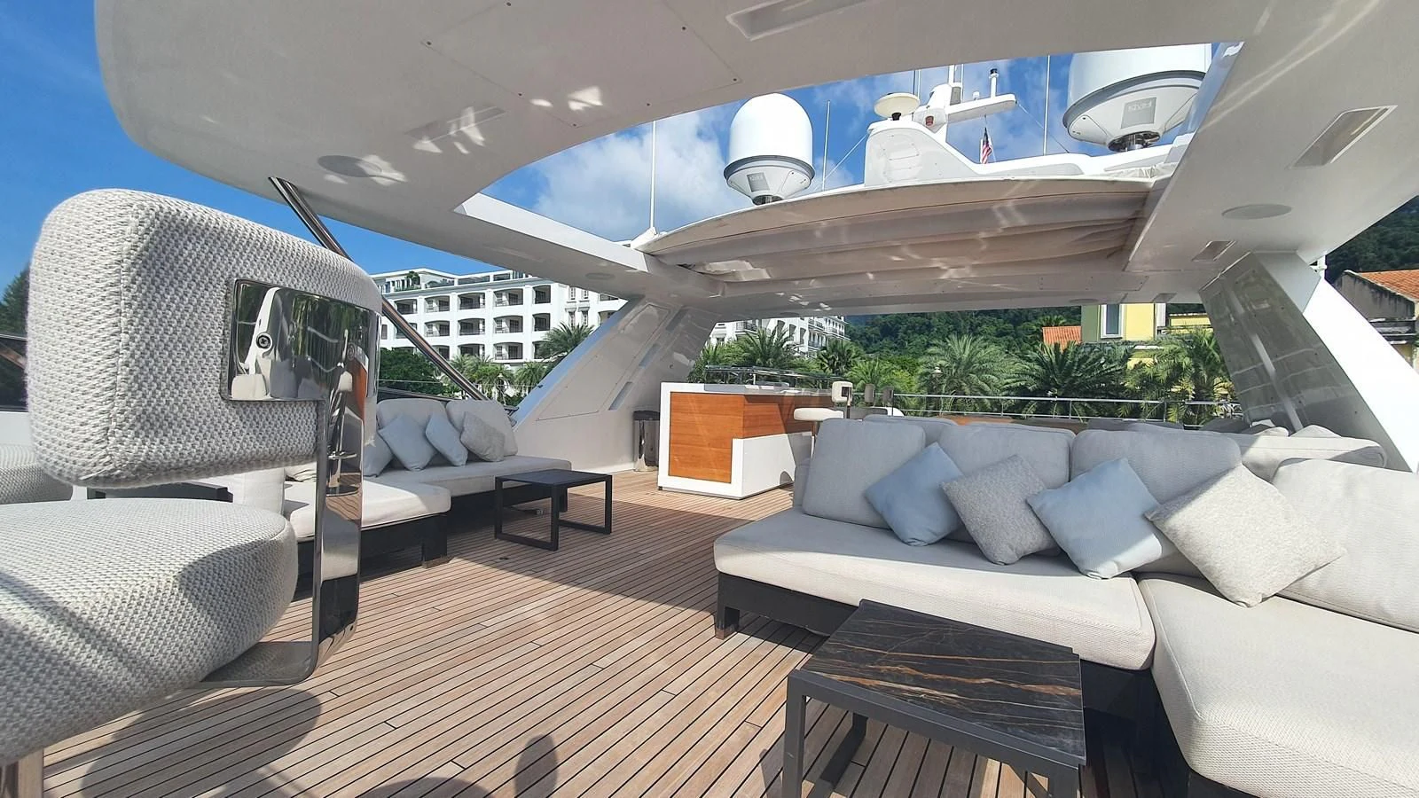a room with a bed and a white couch and a white sofa aboard CALYPSO Yacht for Charter