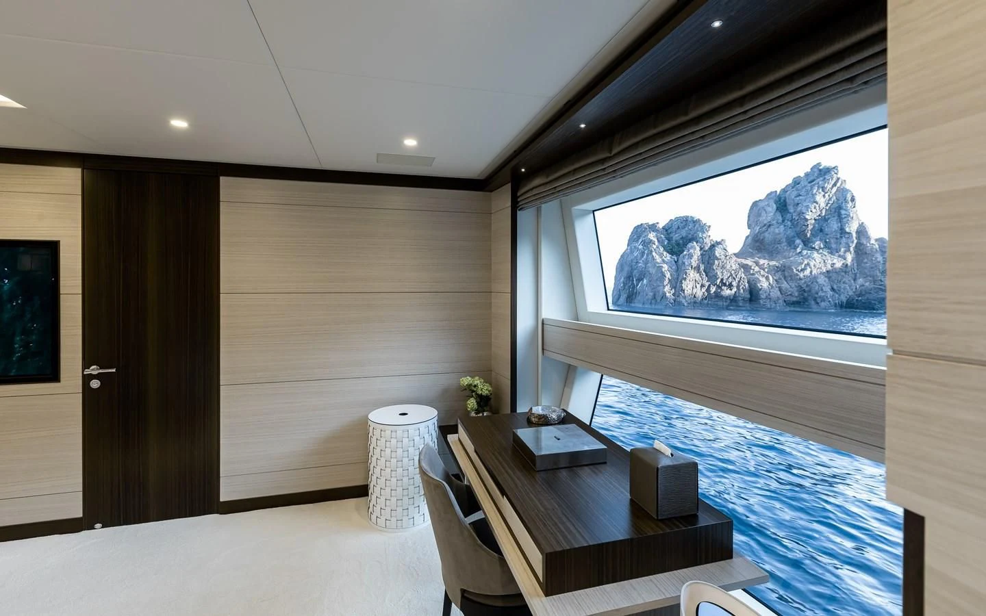 a room with a table and a window aboard CALYPSO Yacht for Charter