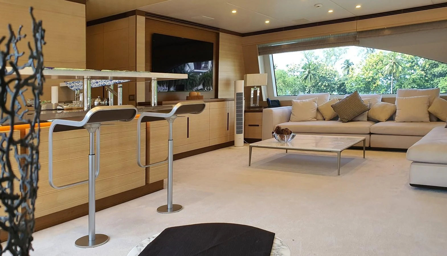 a living room with a table and chairs aboard CALYPSO Yacht for Charter