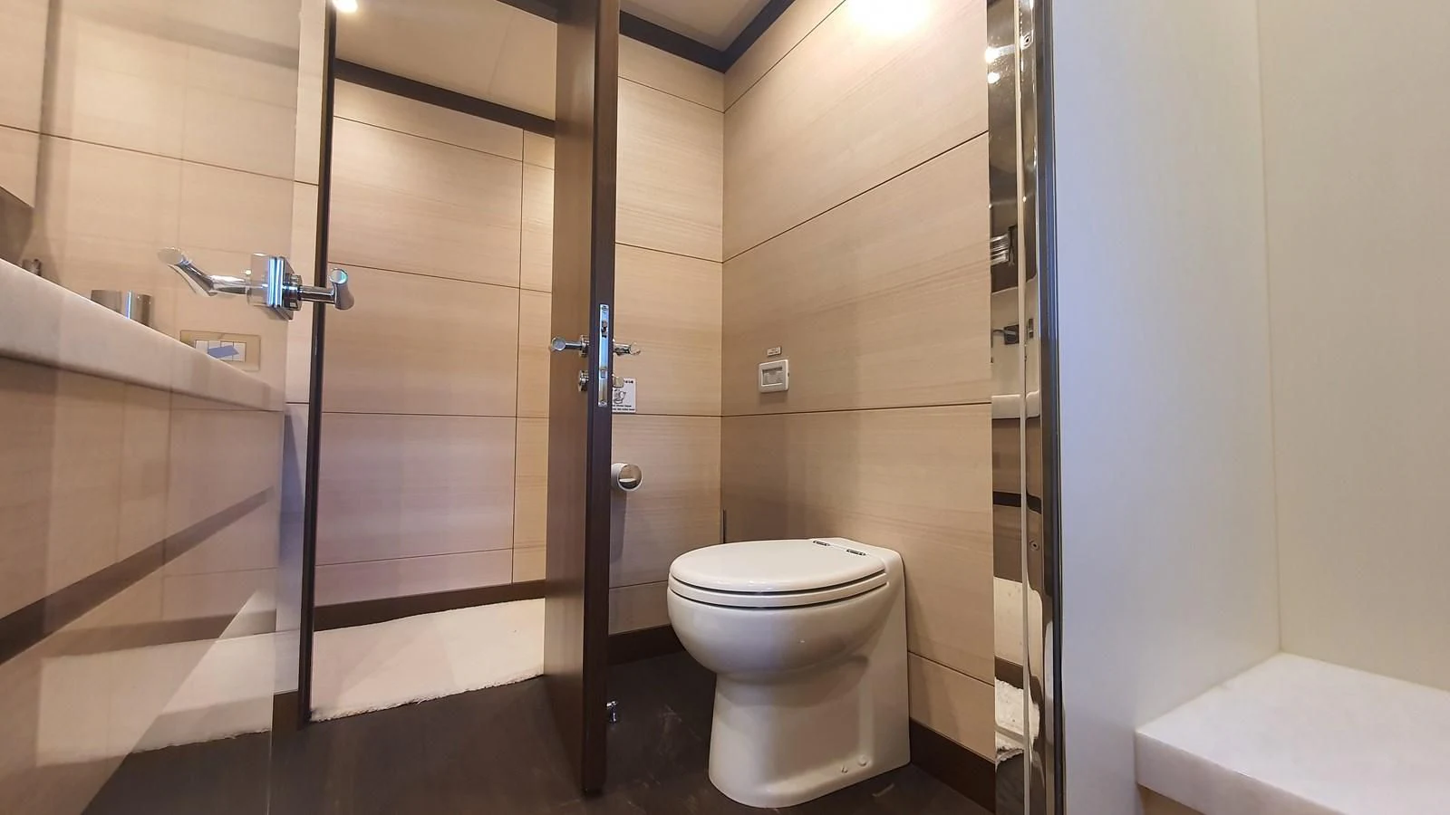 a bathroom with a glass shower aboard CALYPSO Yacht for Charter