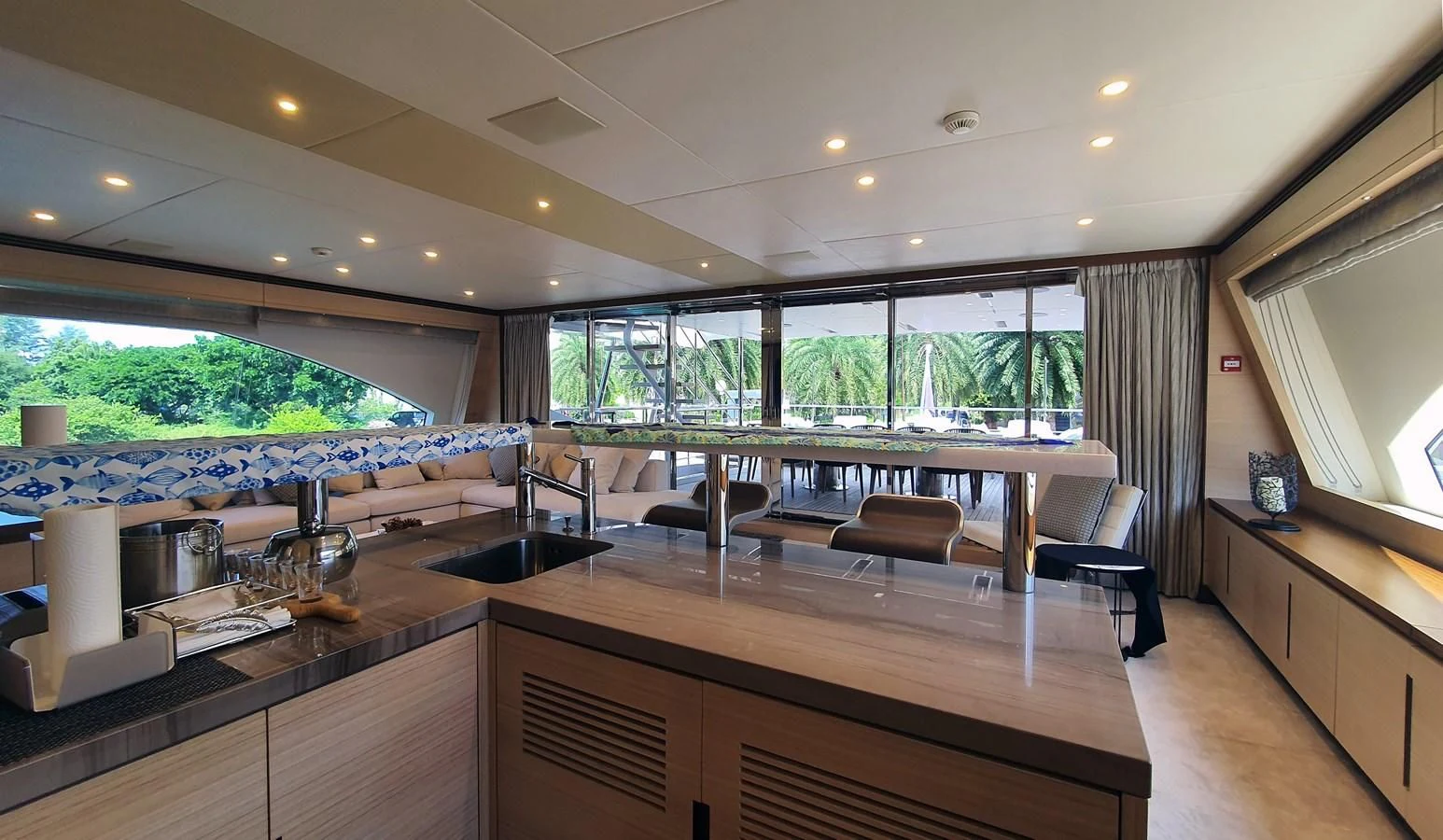a kitchen with a large island aboard CALYPSO Yacht for Charter