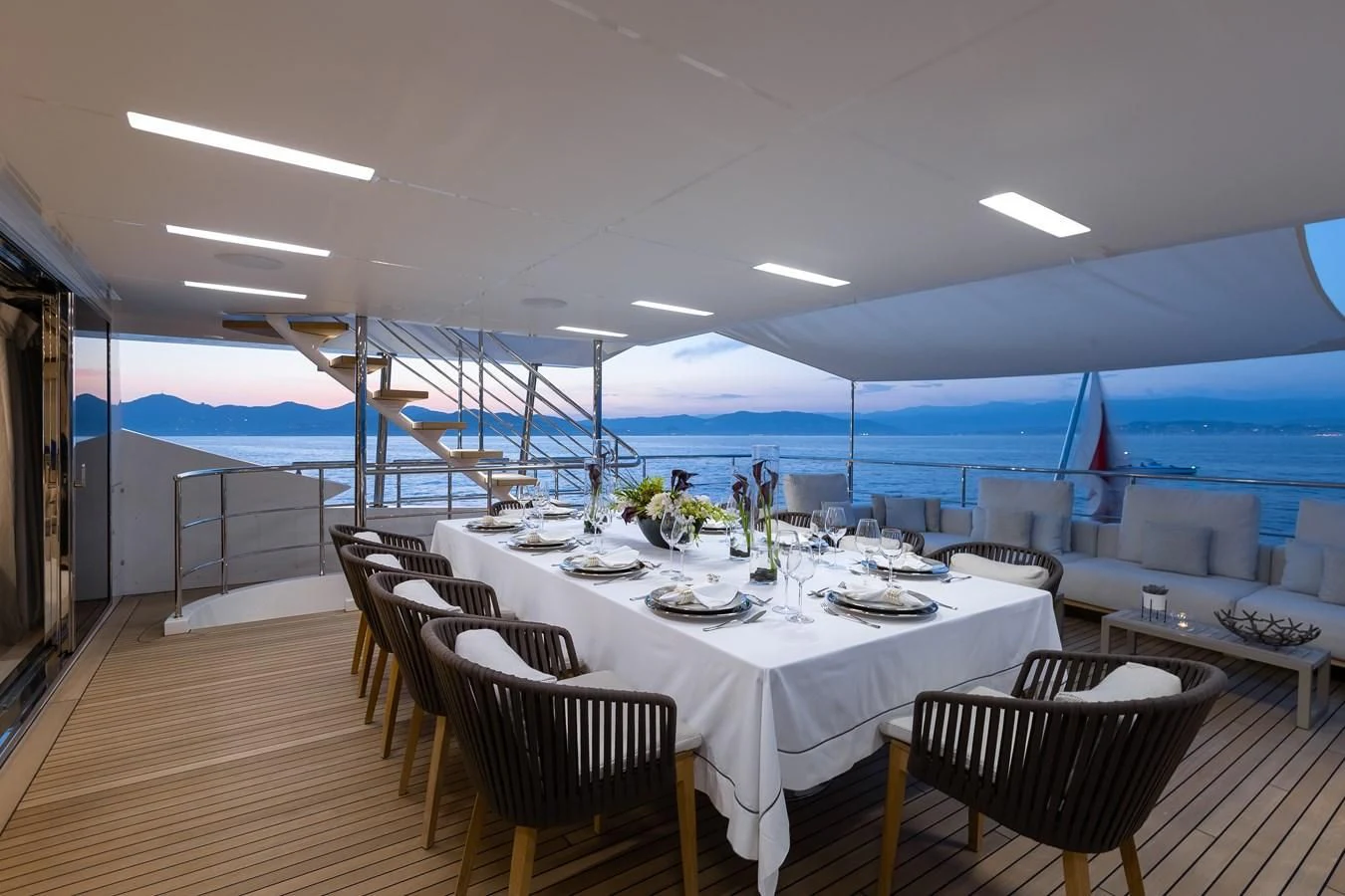 a restaurant with tables and chairs aboard CALYPSO Yacht for Charter