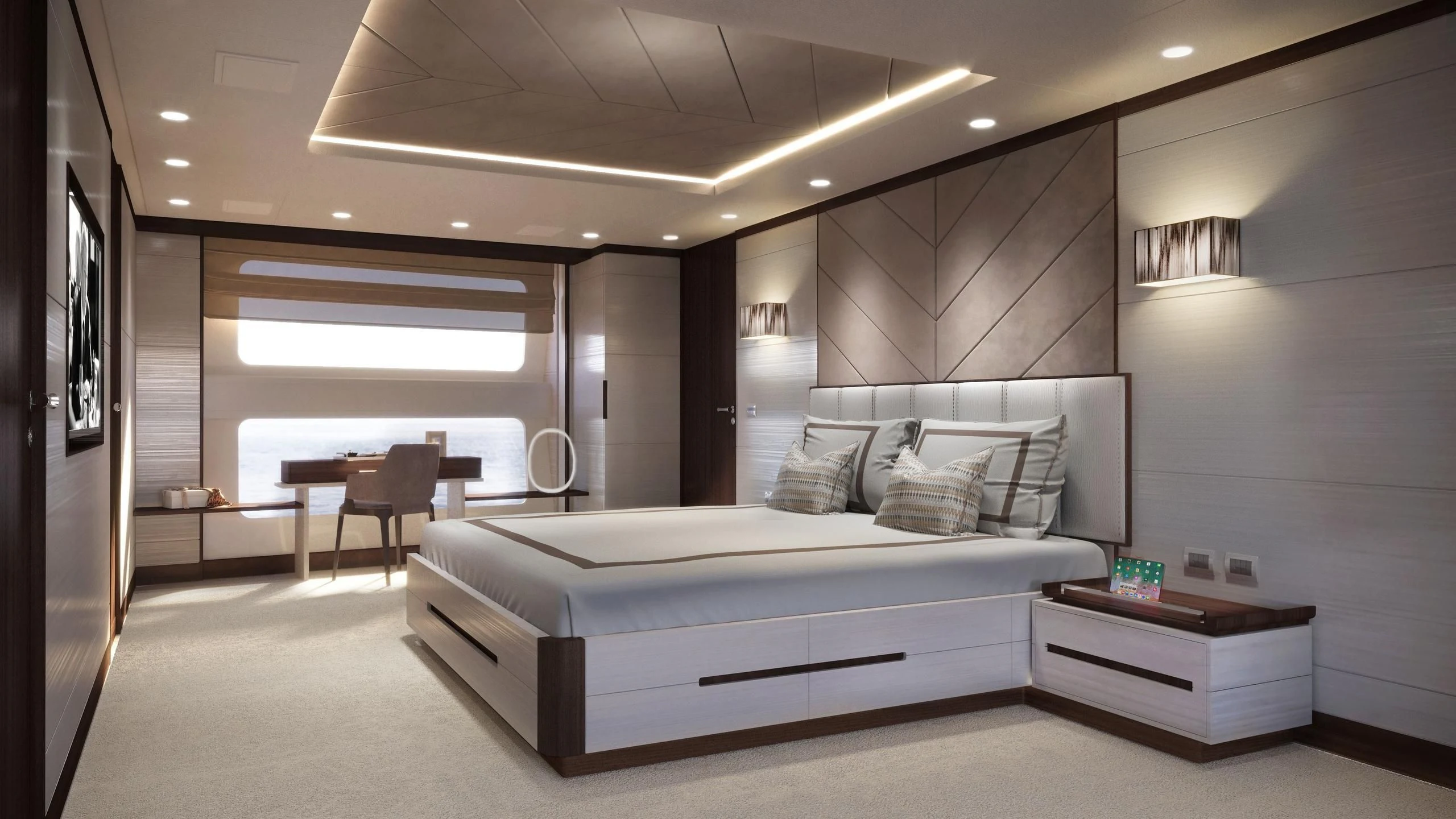 a large bedroom with a bed and a desk aboard CALYPSO Yacht for Charter