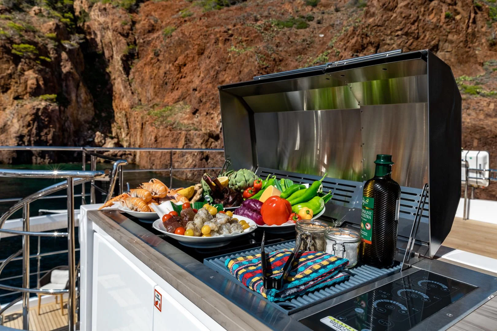 a table with food and drinks on it aboard CALYPSO Yacht for Charter