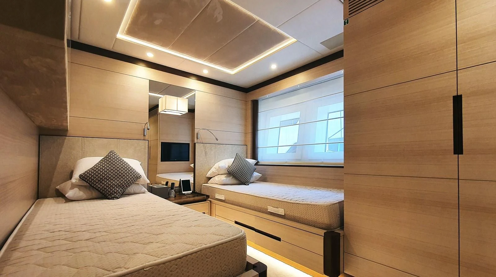 a room with two beds aboard CALYPSO Yacht for Charter